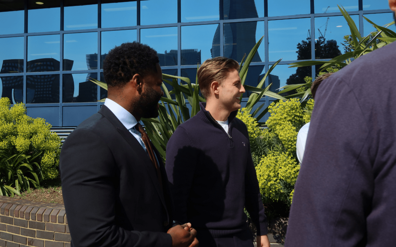 Team photo discussing finding the next top talent hires